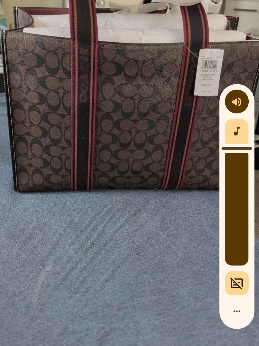 Coach Brown Signature Canvas Tote with Red-Trim Straps and Black Handles